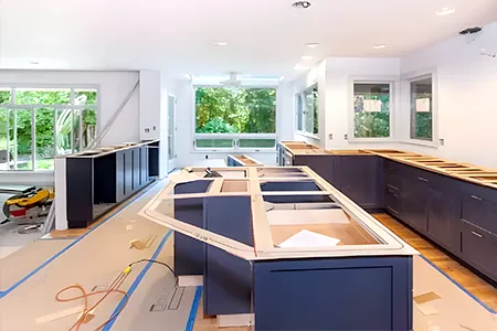 Advanced digital laser templating for precise countertop measurements in a Massachusetts home.