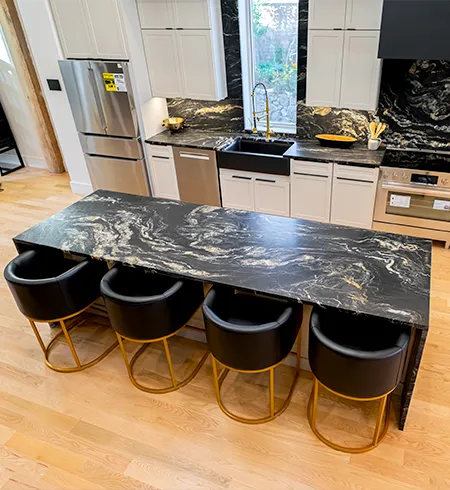 High-end stone countertop and fireplace displays featuring custom fabrication in Winthrop, MA.