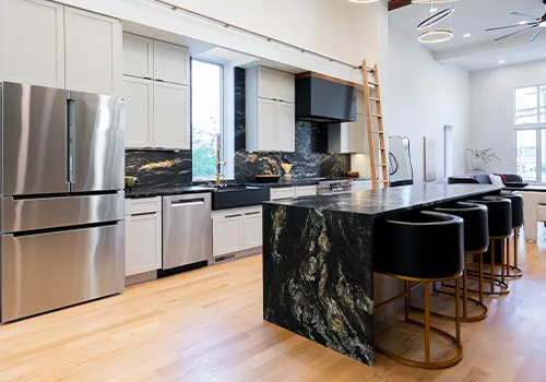 Modern kitchen design preview in Peabody, MA, featuring a large dark stone island used in our virtual kitchen visualizer tool.