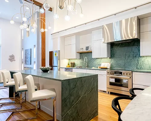 Custom kitchen countertop installation with a premium white quartz island in Peabody, MA by Costa's Stone.